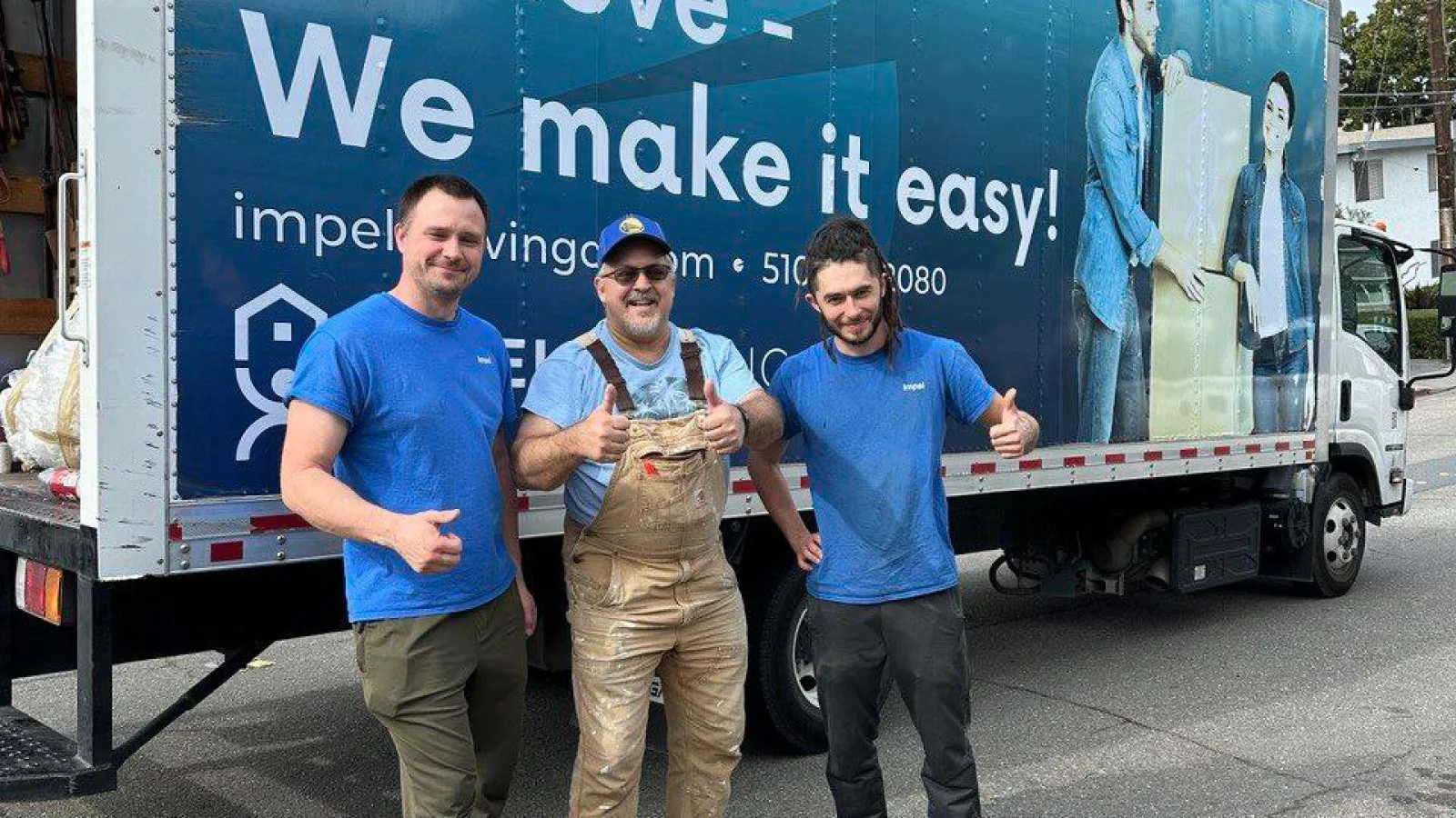 Impel Moving crew beside a moving truck during a Bay Area relocation