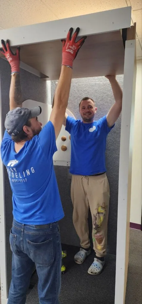 Impel crew reassembling furniture at the destination home